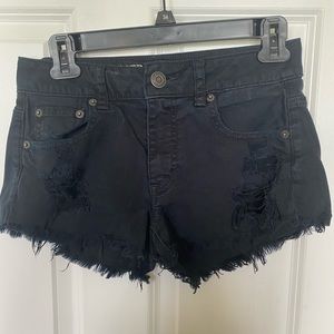 Black Jean shorts.